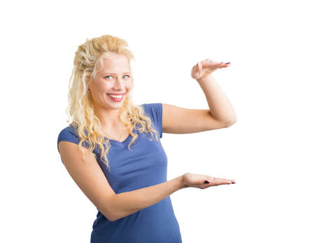 Woman holding invisible objectの写真素材