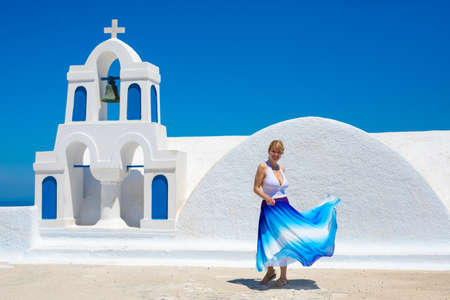 Woman dancing in Santorini island, Greeceの写真素材