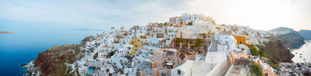 Panorama of Oia town in Santori by sunriseの写真素材