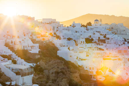 Sunrise over Santorini, image with optical sun flaresの写真素材