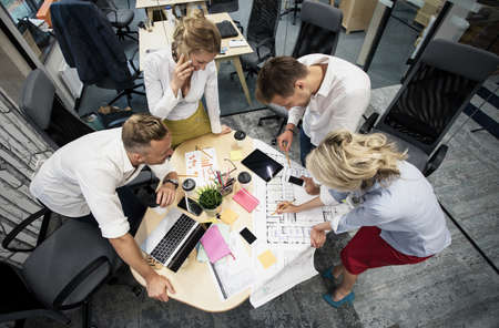 Co-workers working in groupの写真素材