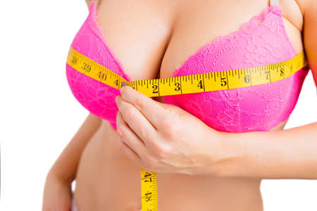Woman taking her bra measurementsの写真素材