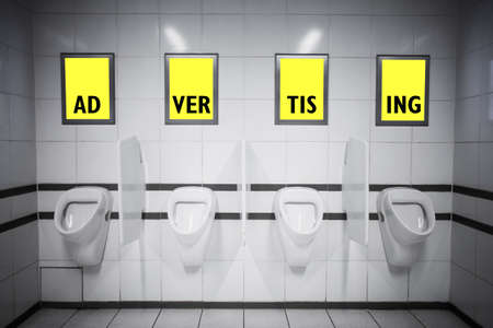 Advertising posters in bathroomの写真素材