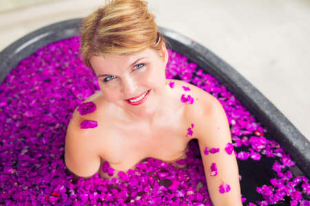 Woman in flower bathの写真素材