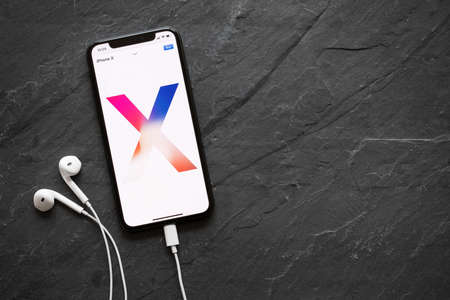 Riga, Latvia - March 25, 2018: Apple website featuring iPhone X shown on the iPhone X itself.のeditorial素材