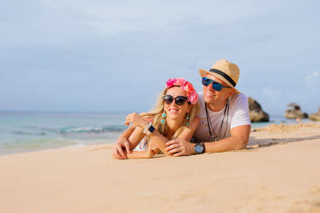 Happy couple on the beachの写真素材
