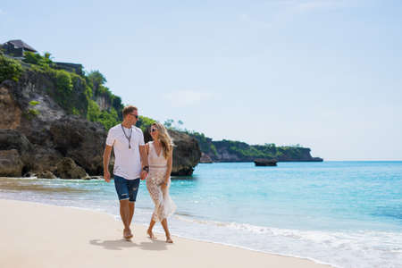 Couple enjoying vacation by the oceanの写真素材