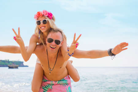 Cheerful couple smiling and enjoying summerの写真素材