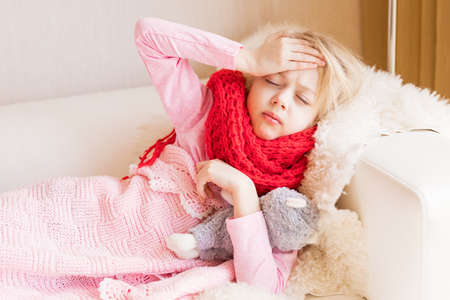 Little sick girl having headacheの写真素材