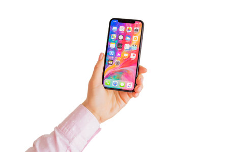 Riga, Latvia - March 15, 2018: Latest generation iPhone X in hand.