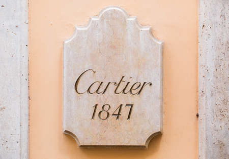 Rome, Italy - May 13, 2018: Cartier logo on wall of store in Rome.のeditorial素材