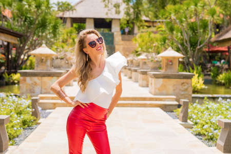 Glamorous woman posing in fancy clothingの写真素材