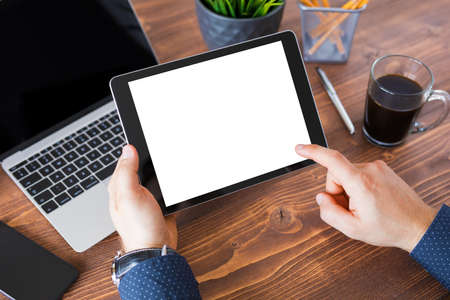 Business man working on tablet computer. Tablet horizontal screen mockup.の写真素材