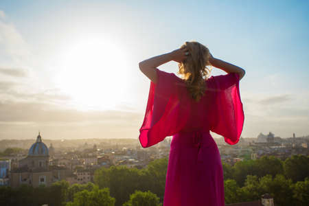 Woman enjoying morning in Romeの写真素材