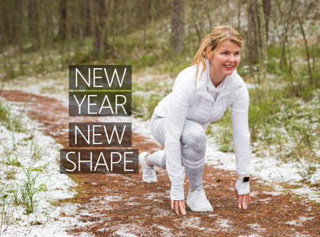 Woman determined to exercise more in New Yearの写真素材