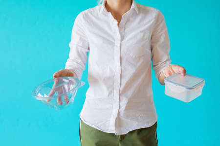 Zero waste concept. Woman choosing to use multi-use food containers.の写真素材