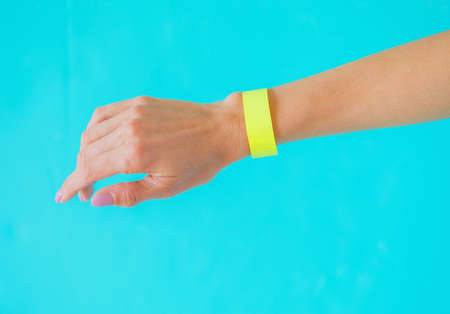 Mockup template of yellow arm bracelet wristbandの写真素材