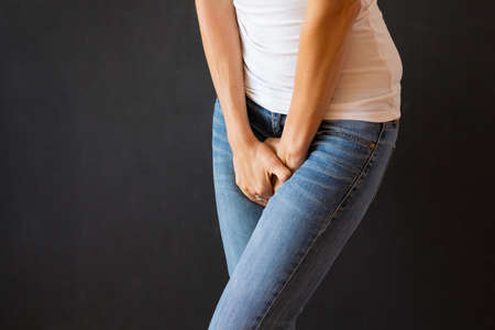 Woman needs to peeの写真素材