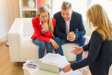Couple consulting professional adviserの写真素材