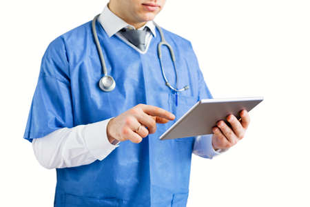 Doctor using technology, isolated on white backgroundの写真素材