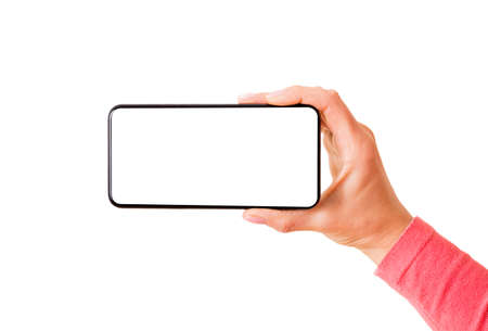 Person holding smartphone with empty white screen horizontally, photo isolated on white backgroundの写真素材