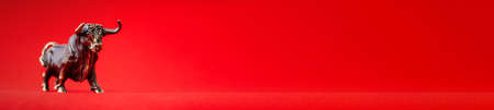 Red banner with generic bull figurineの写真素材