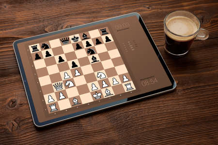 Digital tablet with chess app on screenの写真素材