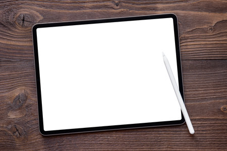 White screen mockup of tablet computer. Wireless stylus pen for drawing or writing on the screen.の写真素材