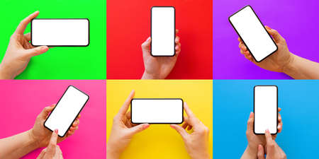 Set of photos with mobile phone in hand on different bright colored backgroundの写真素材