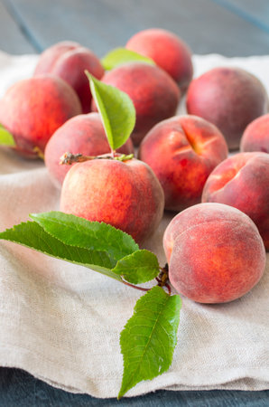 peaches on a wooden background. Country style. Healthy eating.