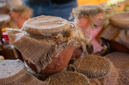 jars with honey on market.  Homemade honey. various jars of honey.の写真素材
