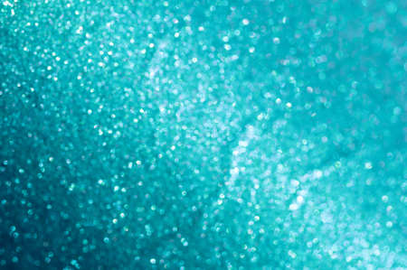 Blue glitter texture christmas abstract background. Shiny wrapping paper texture, greeting card design elementの写真素材