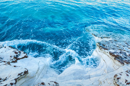 White cliffs by the sea. Rest by the sea. Sea coast, waves.