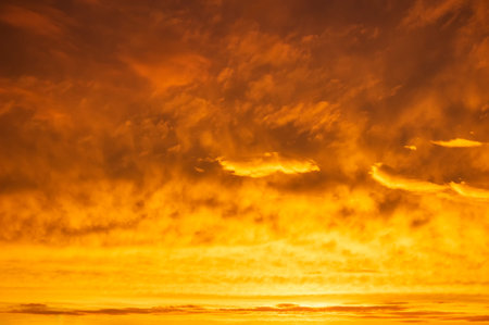 Orange sky Colorful sunset. Flaming orange clouds after rain. Abstract background.