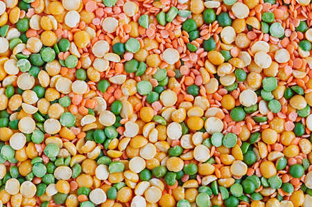 Dried peas and lentils close-up. Background from a mixture of legumes. Top view.の写真素材