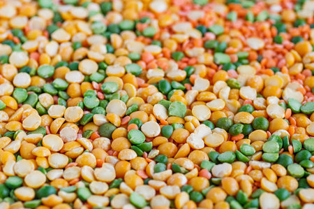 Dried peas and lentils close-up. Background from a mixture of legumes. Selective focus, close up.