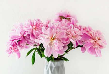 Still life with a beautiful bouquet of pink peony flowers. close-up. selective focus.の写真素材
