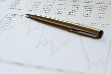 document and pen on tableの写真素材