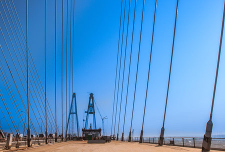 Construction of the bridge. The bridge on the cables. Metal structures. The long bridge. Designing...