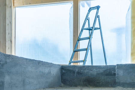 Building concept. Construction works. Metal staircase. Empty construction site.の写真素材