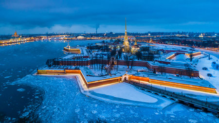 St. Petersburg in the winter. View of the Peter and Paul Fortress. Neva River. Russia. The panorama of the river is not in Petersburg. Rabbit Island. Architecture of Russia. The ice is on the Neva.の写真素材