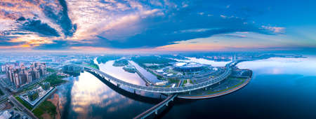 Streets of St. Petersburg from a height. Beautiful aerial view from the bird's eye view of the Gulf of Finland, Saint-Petersburg, Russia, with a stadium. Krestovsky Island.の写真素材