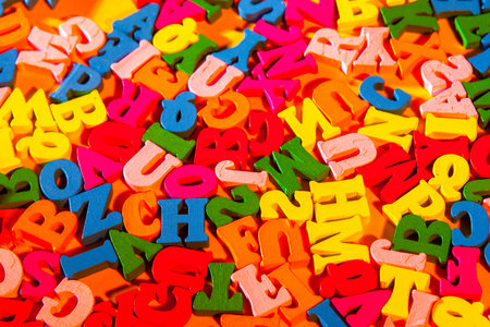 English letters on a yellow background. English letters. English alphabet. Colored letters. Small...