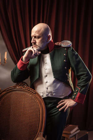 A male Napoleon army officer. Military uniform of the Napoleon era. Army officer 1812.の写真素材