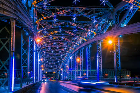 Russia. Bridges of Saint Petersburg. The bridge is decorated with light garlands. Bridge over the Neva River in St. Petersburg. New Year's decorations in Russia.の写真素材
