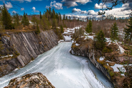 Russia in winter. Marble quarry in Karelia. Village of Ruskeala. Winter view of the quarry in...
