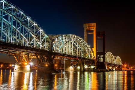 Bridges of Saint Petersburg. Panorama of the bridge across the Neva River in St. Petersburg. The railway bridge over the river. Russia.の写真素材