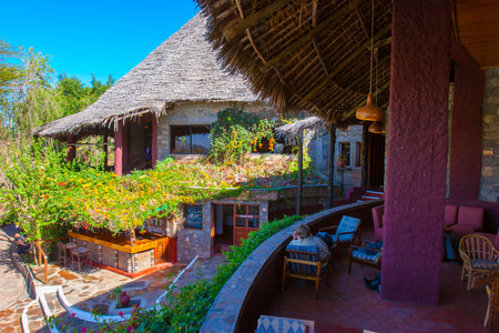 Hotel in Africa. Kenya. Accommodation in Kenya. Bungalow with a roof of a creeper. Buildings in the African style. December 31, 2005のeditorial素材