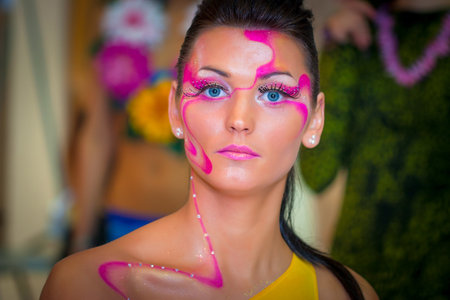 Exhibition of professional make-up in the city of St. Petersburg. Master class of make-up. Girl with bright make-up. Make-up with sequins and rhinestones. 02/23/2007のeditorial素材