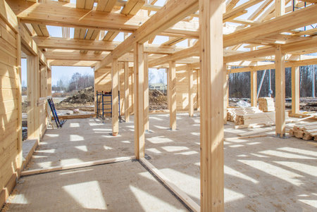 Panorama of the construction site. The foundation for the house. The frame of the cottage....